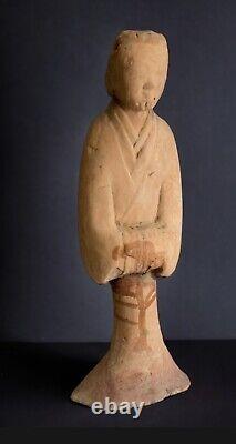 A Chinese Han Dynasty painted pottery figure of a female courtier